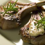 Savor Grilled Lamb Loin Chops Drizzled with Garlic Butter